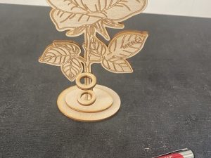 Support stylo en forme de rose